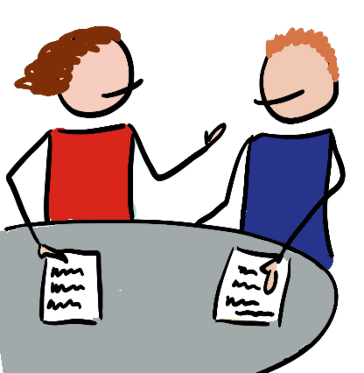 Frau und Mann am Tisch und besprechen sich